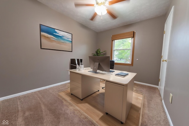 980 Red Maple Ct, Greenwood, IN 46143 - office area with a ceiling fan, baseboards, and light wood finished floors