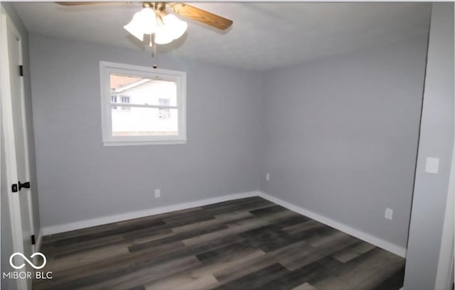 unfurnished room featuring a ceiling fan, baseboards, and dark wood-style floors