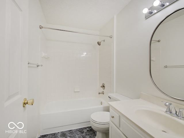 bathroom with toilet, vanity, bathtub / shower combination, and a textured ceiling