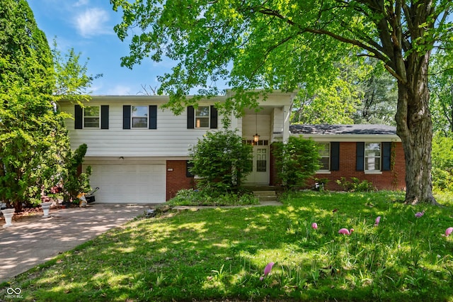 view of front facade featuring brick siding, driveway, an attached garage, and a front yard