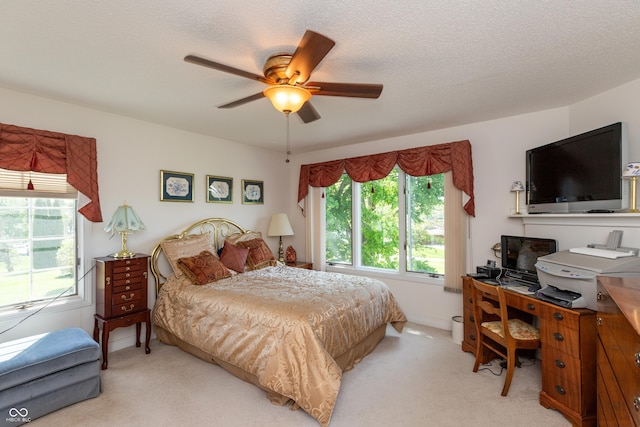 889 E N Shore Dr, Brownstown, IN 47220 - bedroom featuring light colored carpet, a desk, and ceiling fan