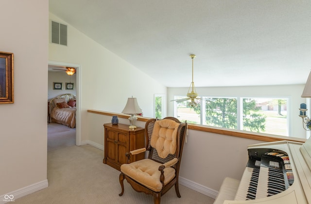 889 E N Shore Dr, Brownstown, IN 47220 - living area featuring light carpet, lofted ceiling, baseboards, and ceiling fan