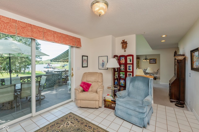 889 E N Shore Dr, Brownstown, IN 47220 - sitting room featuring recessed lighting, a textured ceiling, tile patterned flooring, and baseboards