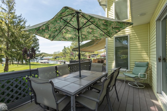 889 E N Shore Dr, Brownstown, IN 47220 - wooden deck with outdoor dining space