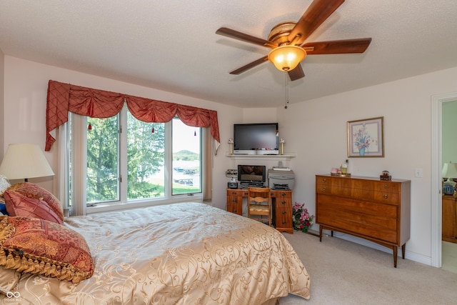 889 E N Shore Dr, Brownstown, IN 47220 - bedroom with light colored carpet and a ceiling fan