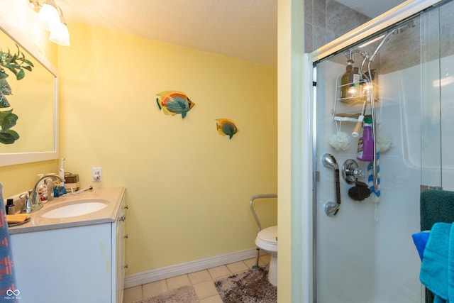 889 E N Shore Dr, Brownstown, IN 47220 - full bathroom with tile patterned flooring, a stall shower, vanity, toilet, and baseboards
