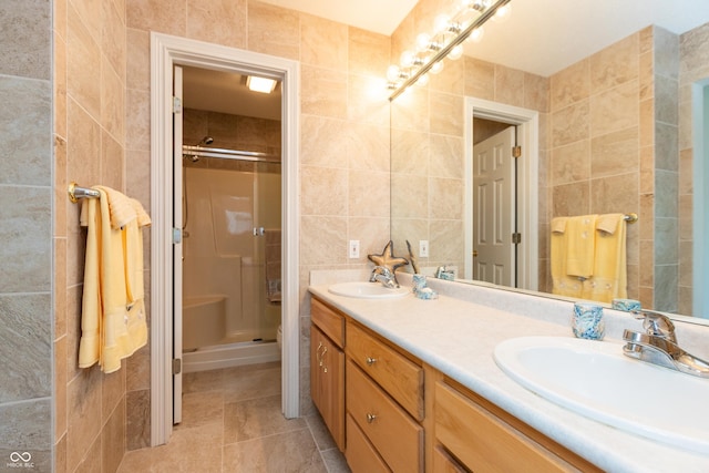 889 E N Shore Dr, Brownstown, IN 47220 - bathroom featuring tile walls, a stall shower, and double vanity