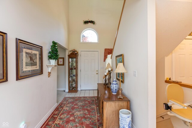 889 E N Shore Dr, Brownstown, IN 47220 - foyer with a high ceiling, baseboards, and tile patterned floors
