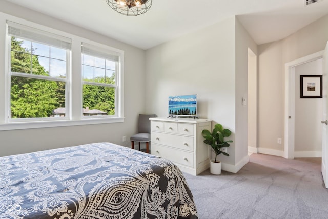 9155 Kerwood Dr, Indianapolis, IN 46240 - bedroom with light colored carpet and baseboards