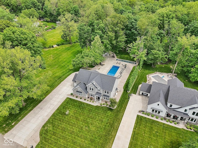 9155 Kerwood Dr, Indianapolis, IN 46240 - view of subject property featuring a pool area and a forest
