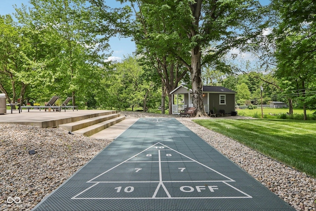 9155 Kerwood Dr, Indianapolis, IN 46240 - view of community with shuffleboard, a lawn, an outbuilding, and view of scattered trees