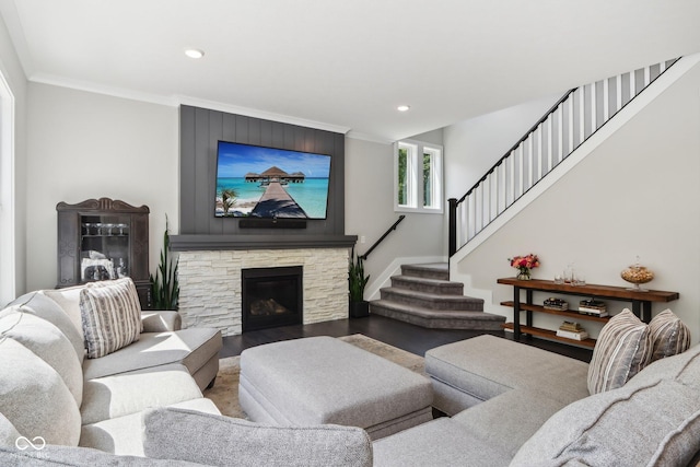 9155 Kerwood Dr, Indianapolis, IN 46240 - living room with stairway, a stone fireplace, crown molding, recessed lighting, and wood finished floors