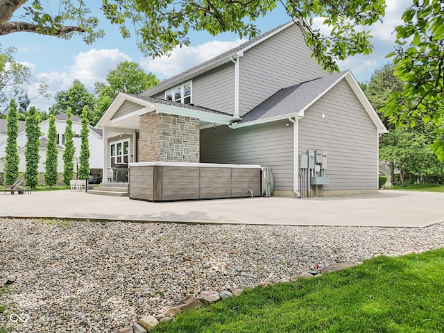 9155 Kerwood Dr, Indianapolis, IN 46240 - view of side of property featuring a patio area and stone siding