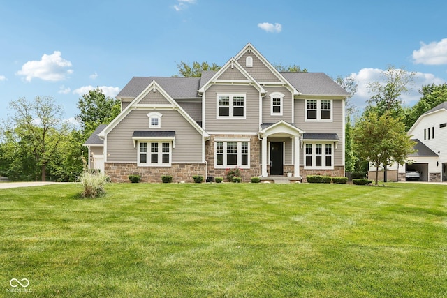 9155 Kerwood Dr, Indianapolis, IN 46240 - craftsman house with a front yard and stone siding