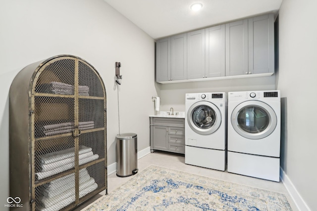 9155 Kerwood Dr, Indianapolis, IN 46240 - washroom featuring cabinet space, washer and clothes dryer, and baseboards
