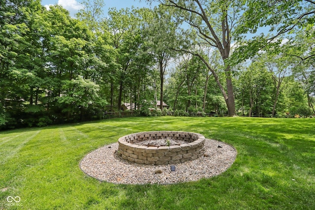 9155 Kerwood Dr, Indianapolis, IN 46240 - view of green lawn featuring an outdoor fire pit