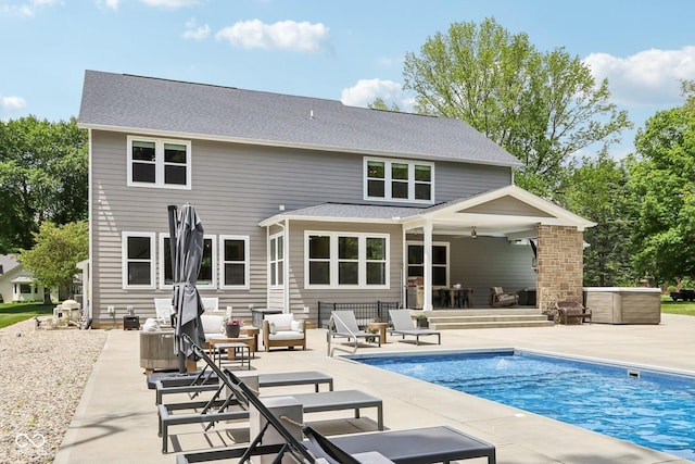 9155 Kerwood Dr, Indianapolis, IN 46240 - back of property with a patio, an outdoor pool, a shingled roof, and ceiling fan