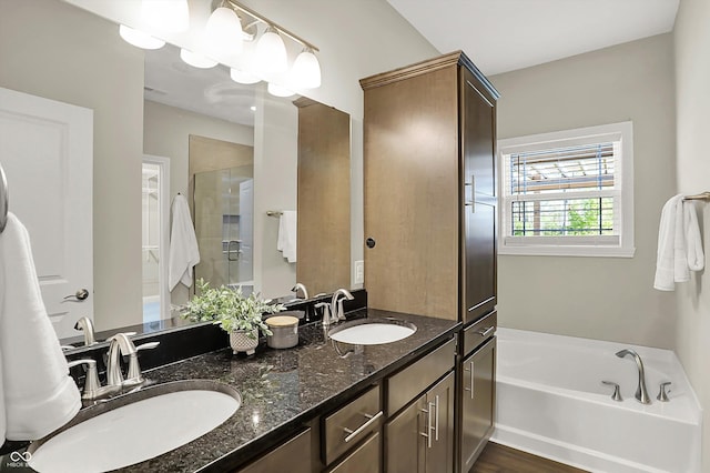 6153 Dugan Dr, Whitestown, IN 46075 - full bath with a stall shower, a garden tub, and double vanity
