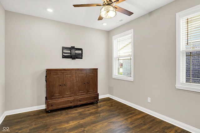 6153 Dugan Dr, Whitestown, IN 46075 - unfurnished room featuring ceiling fan, dark wood-style flooring, baseboards, and recessed lighting