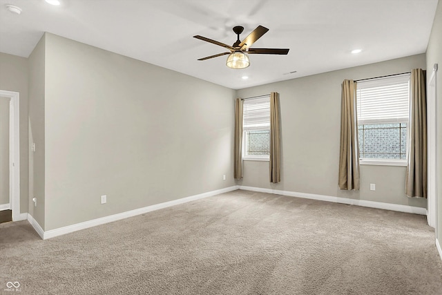 6153 Dugan Dr, Whitestown, IN 46075 - empty room with a ceiling fan, recessed lighting, carpet floors, baseboards, and a smoke detector