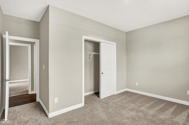 6153 Dugan Dr, Whitestown, IN 46075 - unfurnished bedroom with carpet floors, baseboards, and a closet