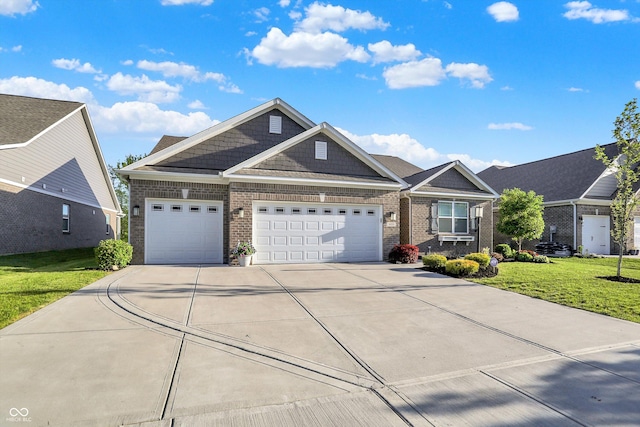 6153 Dugan Dr, Whitestown, IN 46075 - craftsman-style house featuring brick siding, driveway, a front yard, and a garage