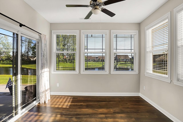 6153 Dugan Dr, Whitestown, IN 46075 - unfurnished sunroom with plenty of natural light and a water view