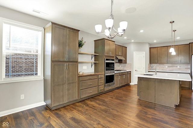 6153 Dugan Dr, Whitestown, IN 46075 - kitchen featuring a sink, open shelves, appliances with stainless steel finishes, plenty of natural light, and recessed lighting