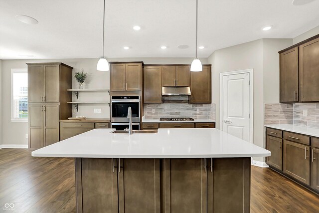 6153 Dugan Dr, Whitestown, IN 46075 - kitchen with open shelves, dark wood-style floors, light countertops, decorative backsplash, and recessed lighting