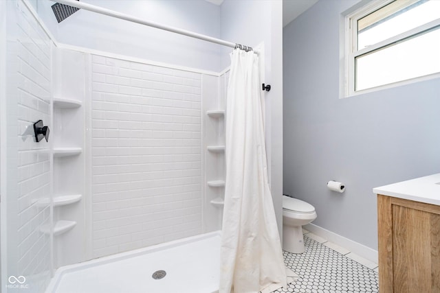 1009 Harrison St, Indianapolis, IN 46202 - full bathroom featuring toilet, tile patterned floors, a shower stall, and vanity