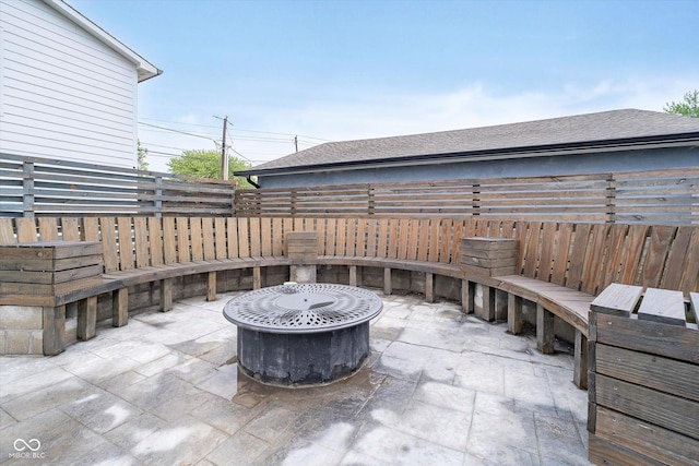 1009 Harrison St, Indianapolis, IN 46202 - view of patio featuring fence and an outdoor fire pit