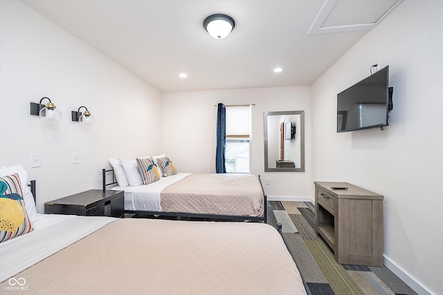 1009 Harrison St, Indianapolis, IN 46202 - bedroom featuring baseboards, recessed lighting, and attic access