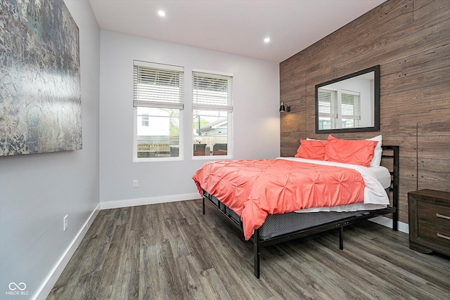 1009 Harrison St, Indianapolis, IN 46202 - bedroom with wood walls, wood finished floors, baseboards, multiple windows, and recessed lighting