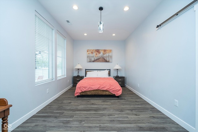 1009 Harrison St, Indianapolis, IN 46202 - bedroom with recessed lighting, dark wood-style flooring, and baseboards