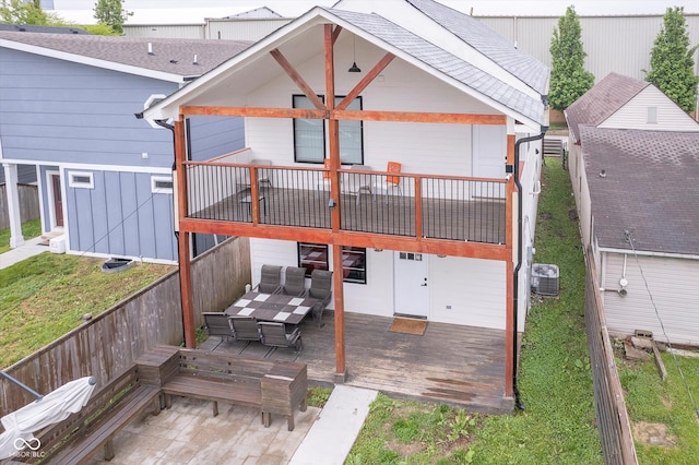 1009 Harrison St, Indianapolis, IN 46202 - rear view of property featuring a wooden deck, central AC, and a shingled roof