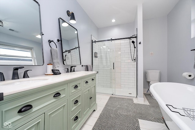 1009 Harrison St, Indianapolis, IN 46202 - full bathroom featuring a shower stall, a soaking tub, and double vanity