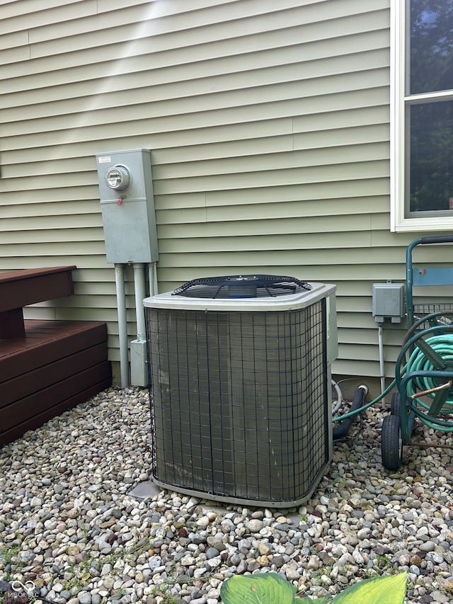 exterior view of cooling unit and electric meter