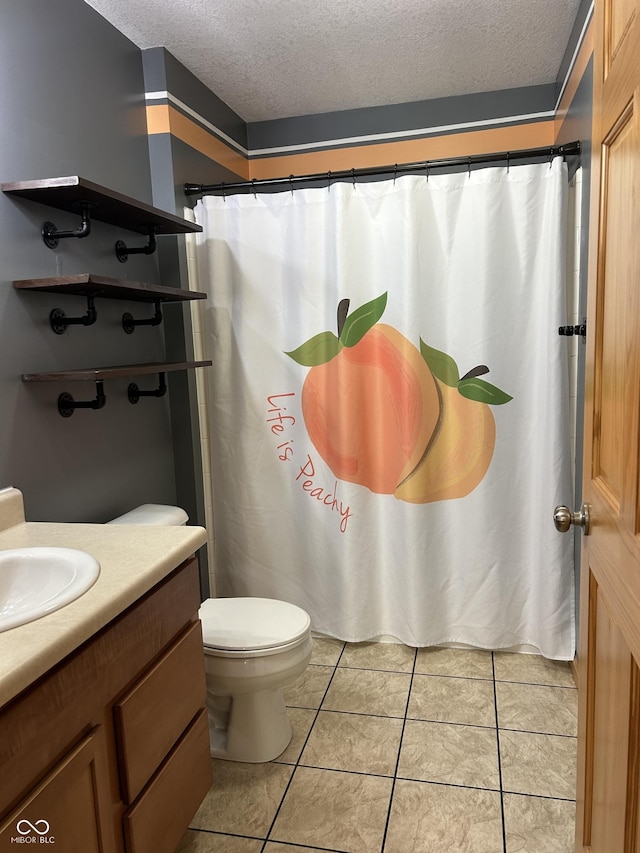 bathroom with a textured ceiling, tile patterned floors, vanity, toilet, and a shower with curtain