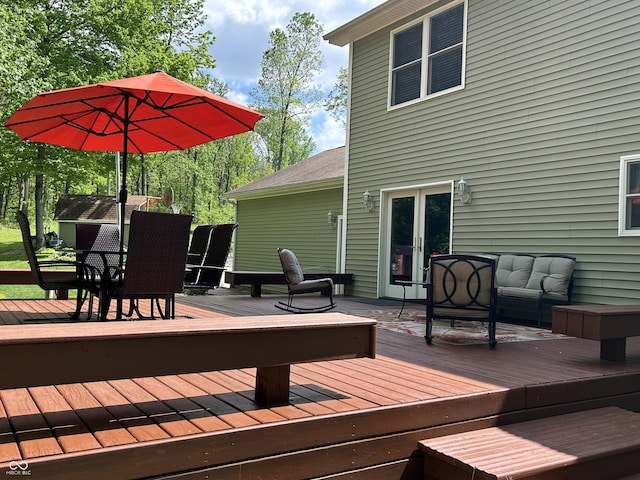 deck with an outdoor hangout area