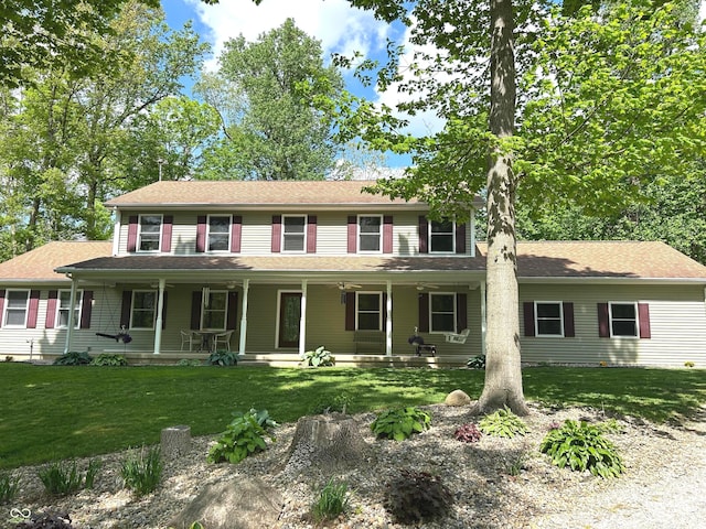 view of front of property with a front lawn and a porch