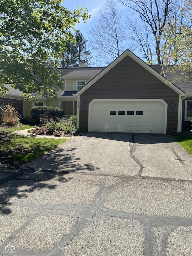 1915 Seaport Dr, Indianapolis, IN 46240 - view of front of house featuring driveway and an attached garage