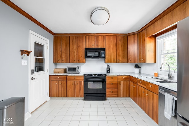 kitchen featuring black appliances, a sink, ornamental molding, and brown cabinets