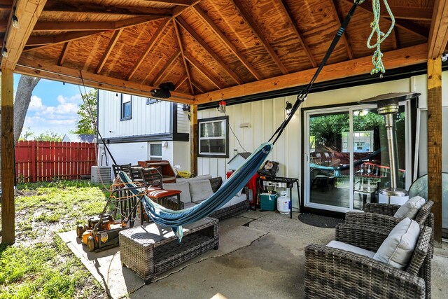 view of patio with a gazebo and fence