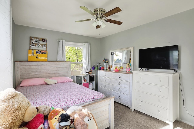bedroom with light carpet and ceiling fan