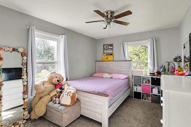 carpeted bedroom featuring ceiling fan