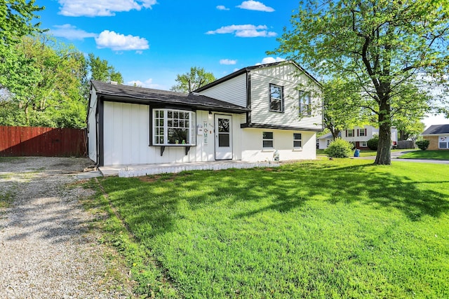 split level home with board and batten siding