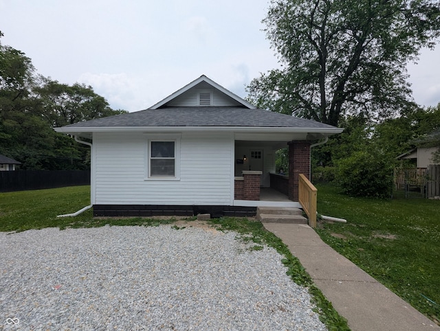 1009 Chestnut St, Anderson, IN 46012 - bungalow-style house featuring a shingled roof and a porch