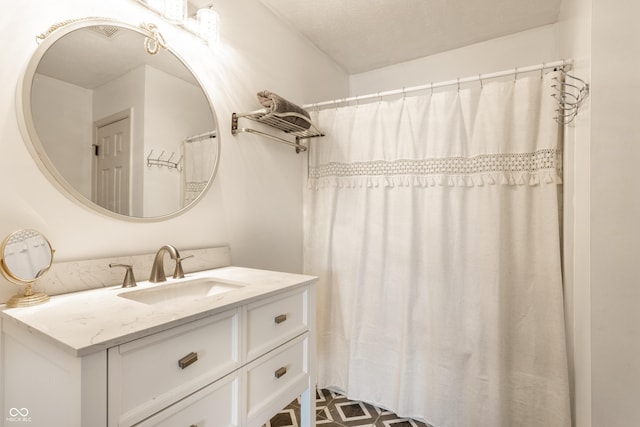 full bathroom featuring vanity