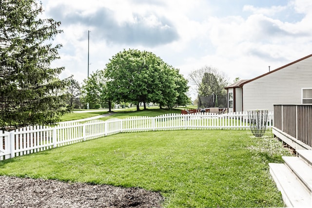 view of yard with a trampoline