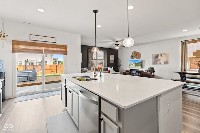 1289 Sunset Blvd, Avon, IN 46123 - kitchen featuring stainless steel dishwasher, a sink, a ceiling fan, light wood-type flooring, and recessed lighting